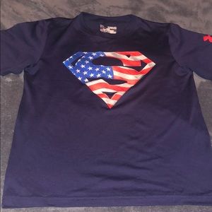 Boys size medium Under Armour navy shirt.